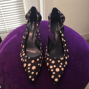 Lightly used coach short heeled shoes,